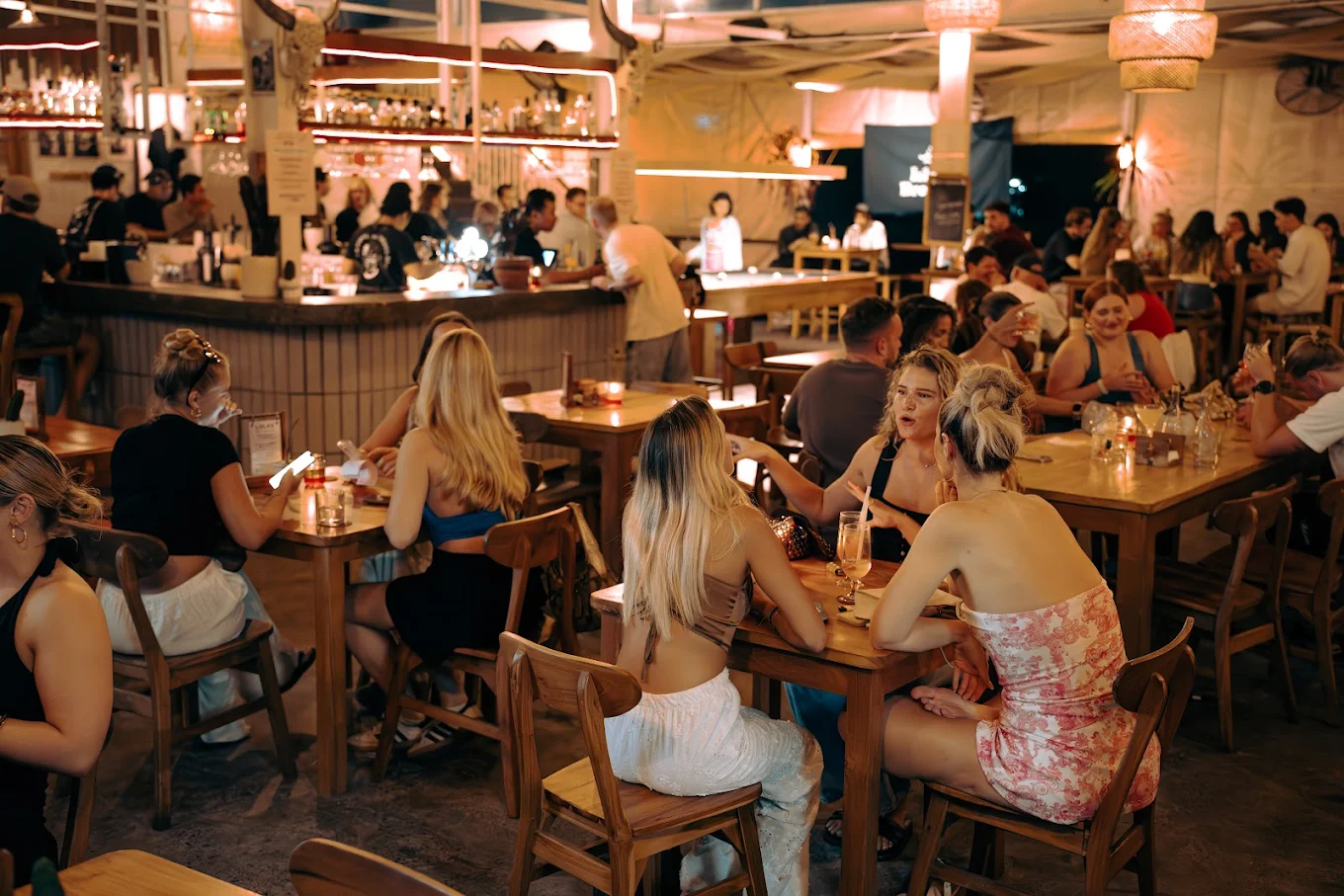 Lola's Canggu — open-air dining room at night